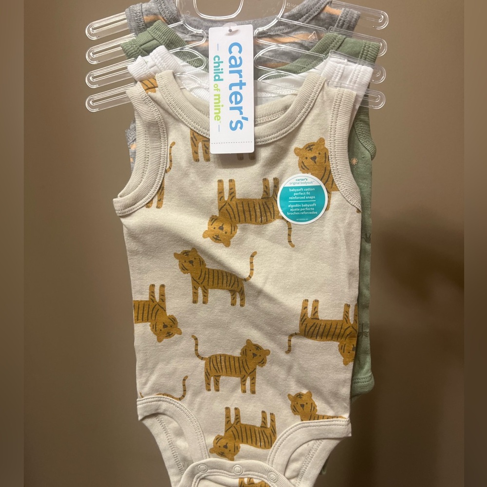Carter’s Child Of Mine 4 pack bodysuits 0-3 months